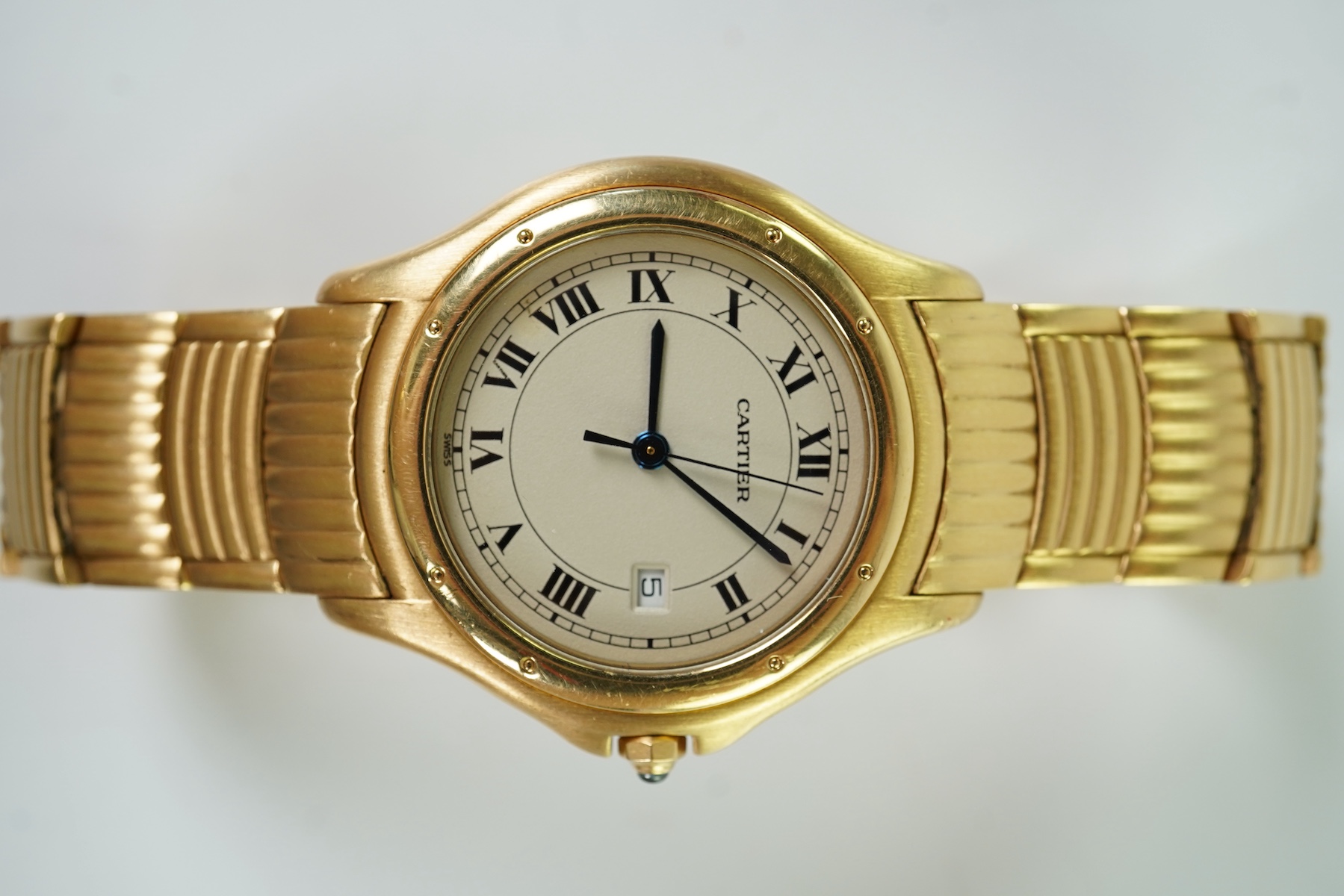 A gentleman's late 20th century 18k gold Cartier Cougar quartz wrist watch